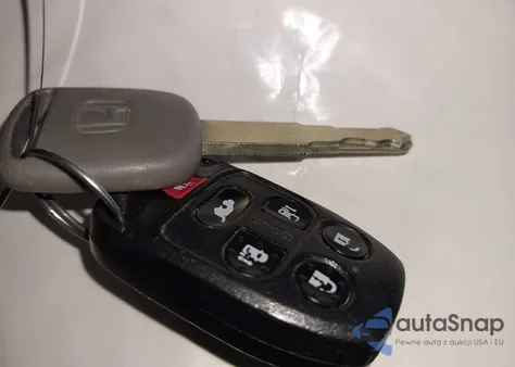 2011 Honda Odyssey Ex-L из США, поврежденный, VIN 5FNRL5H67BB099165